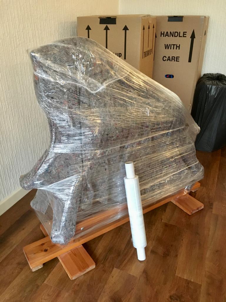 Rocking horse packaged in bubblewrap and shrinkwrap